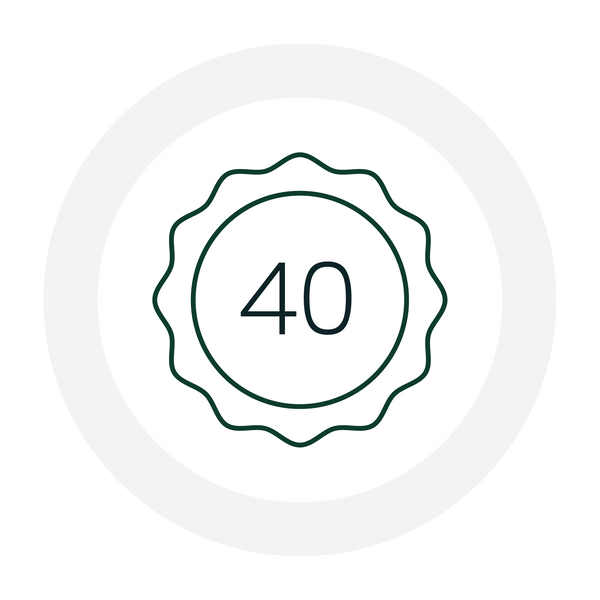 Iconic circular emblem with the number 40 inside a scalloped border.