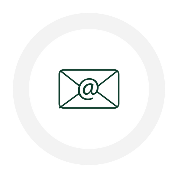 Email icon with an at symbol inside a white circle on a black background.